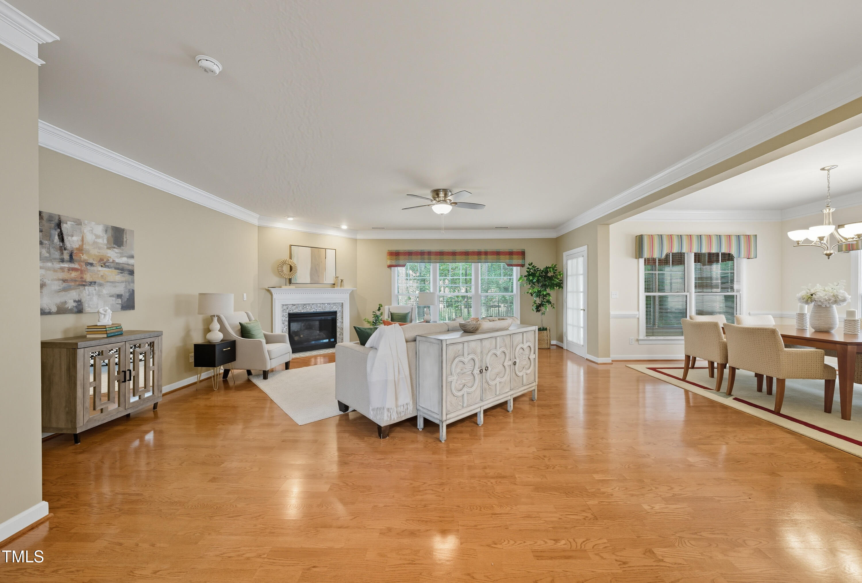 5210 Rio Grande Drive Raleigh, NC 27616 - Photo 16 of 45 a living room with furniture and a fireplace