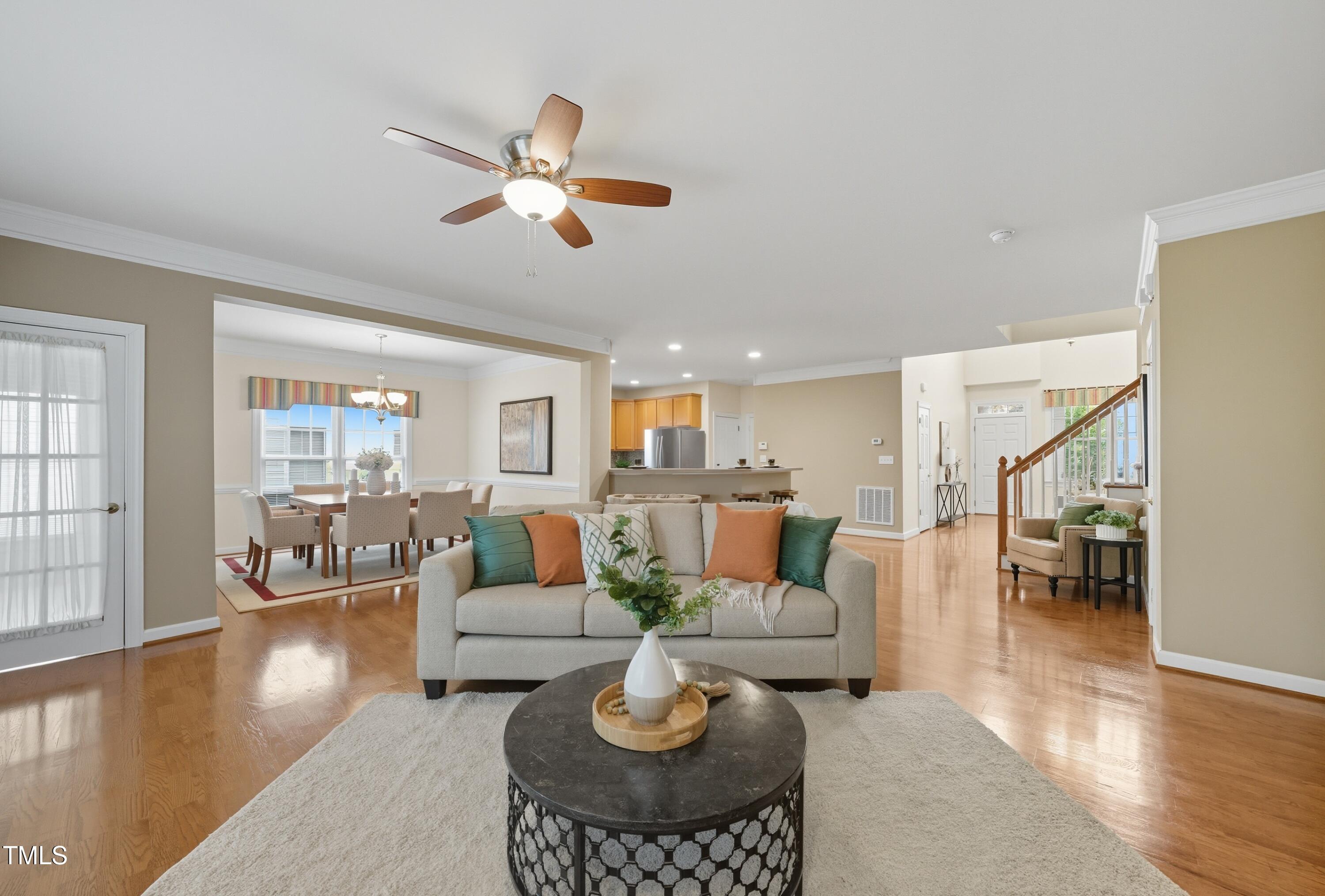 5210 Rio Grande Drive Raleigh, NC 27616 - Photo 21 of 45 a living room with fireplace furniture and a wooden floor