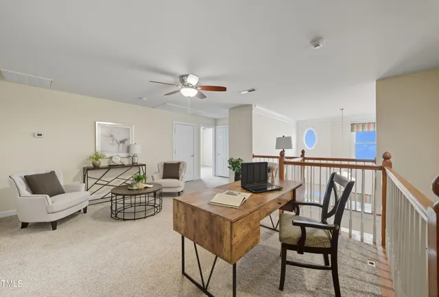 a view of a livingroom with furniture and a couch