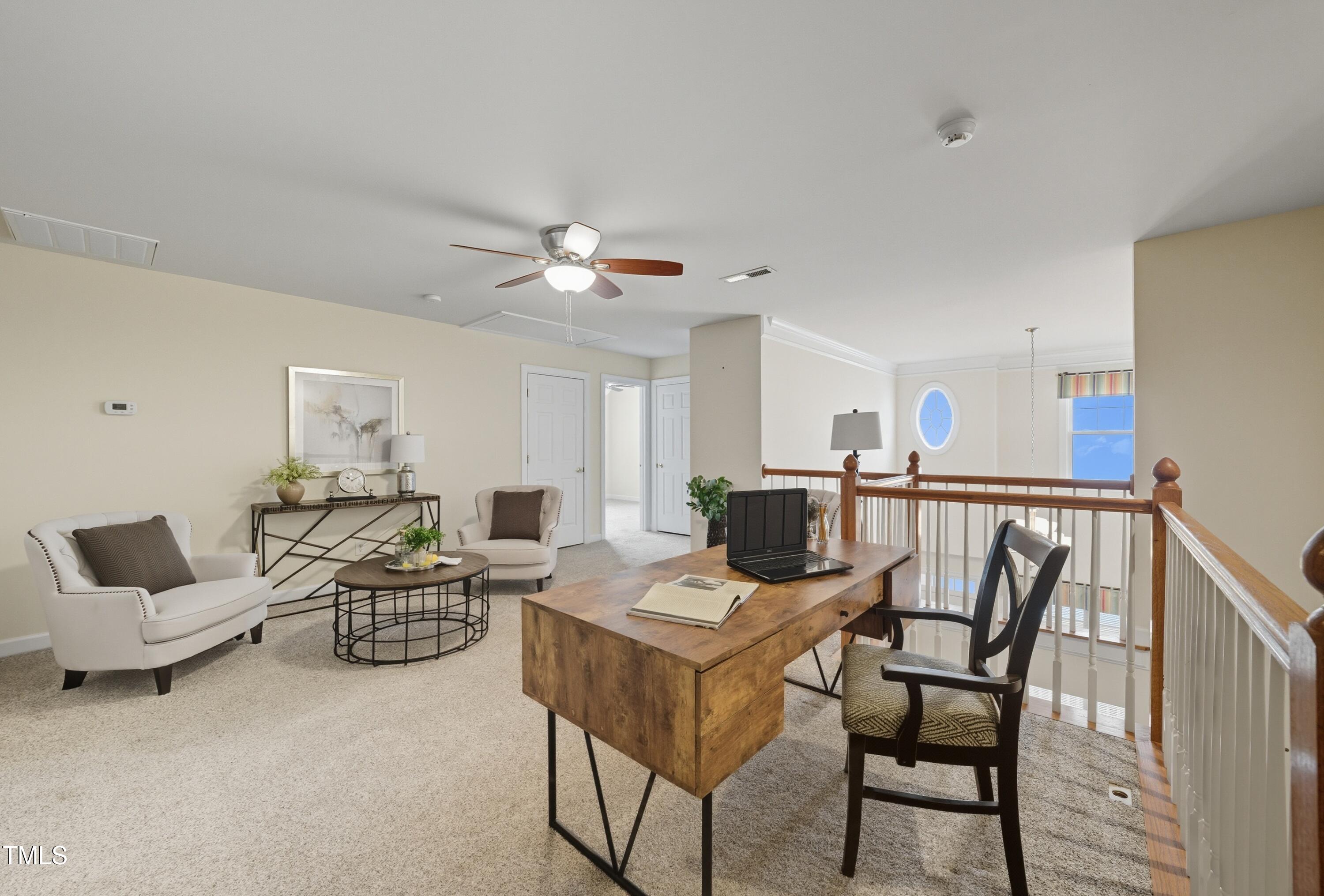 5210 Rio Grande Drive Raleigh, NC 27616 - Photo 24 of 45 a view of a livingroom with furniture and a couch