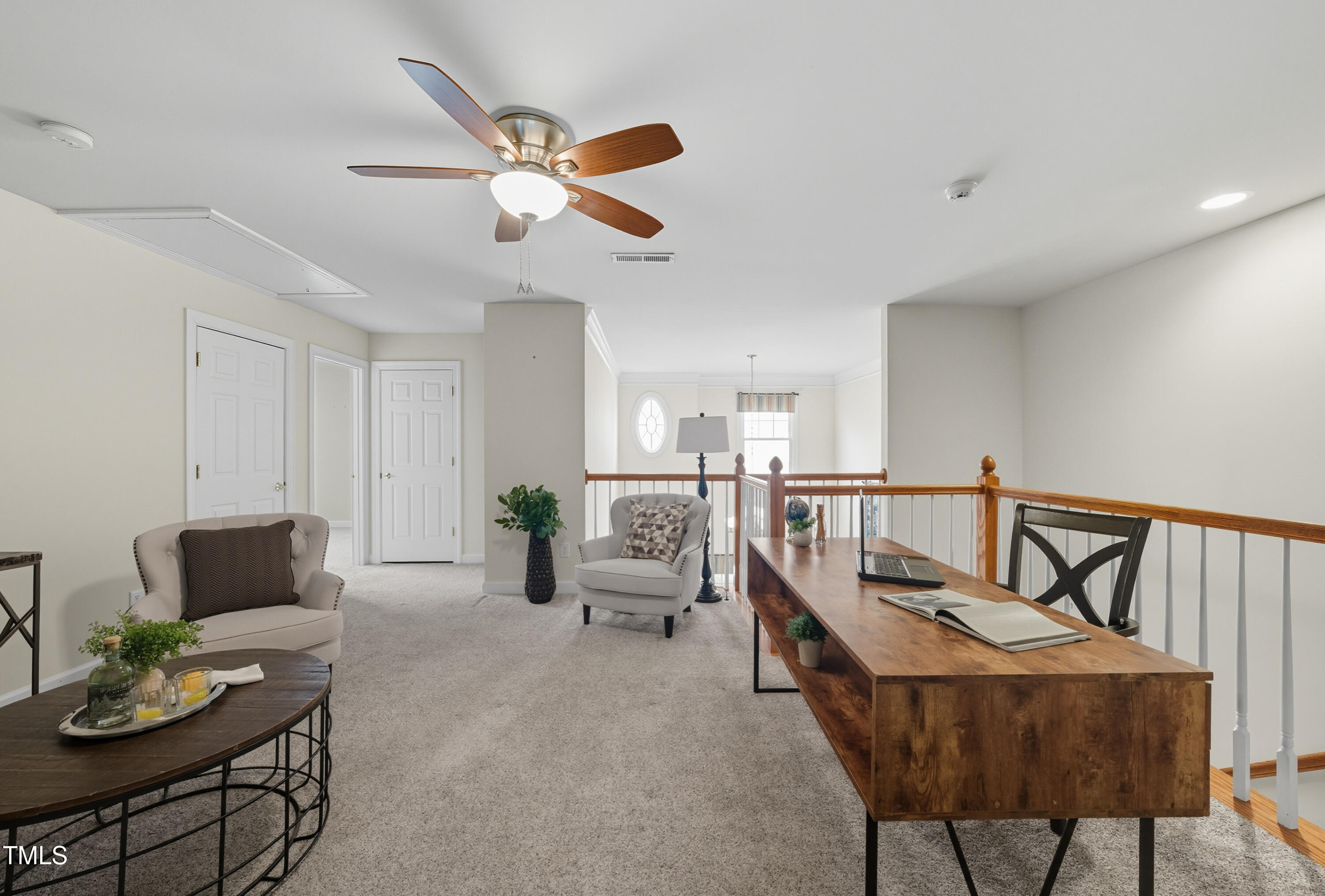 5210 Rio Grande Drive Raleigh, NC 27616 - Photo 25 of 45 a living room with furniture and a wooden floor