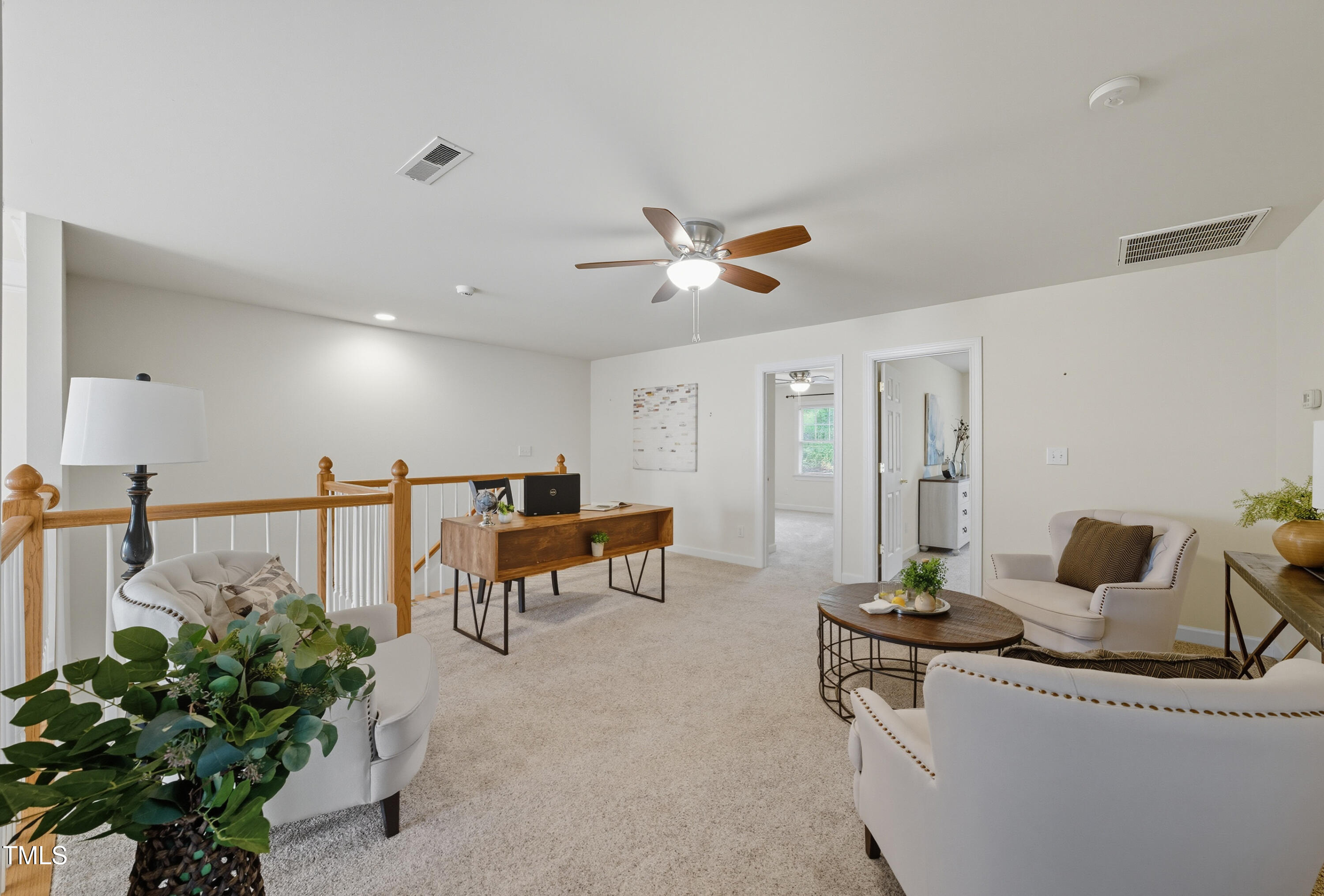 5210 Rio Grande Drive Raleigh, NC 27616 - Photo 26 of 45 a living room with furniture and potted plant