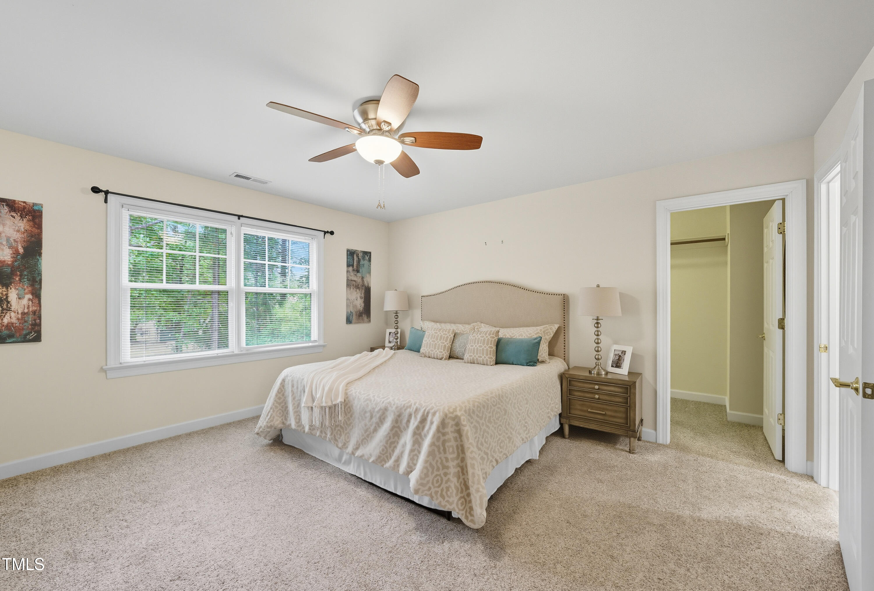 5210 Rio Grande Drive Raleigh, NC 27616 - Photo 28 of 45 a bedroom with a bed and a window