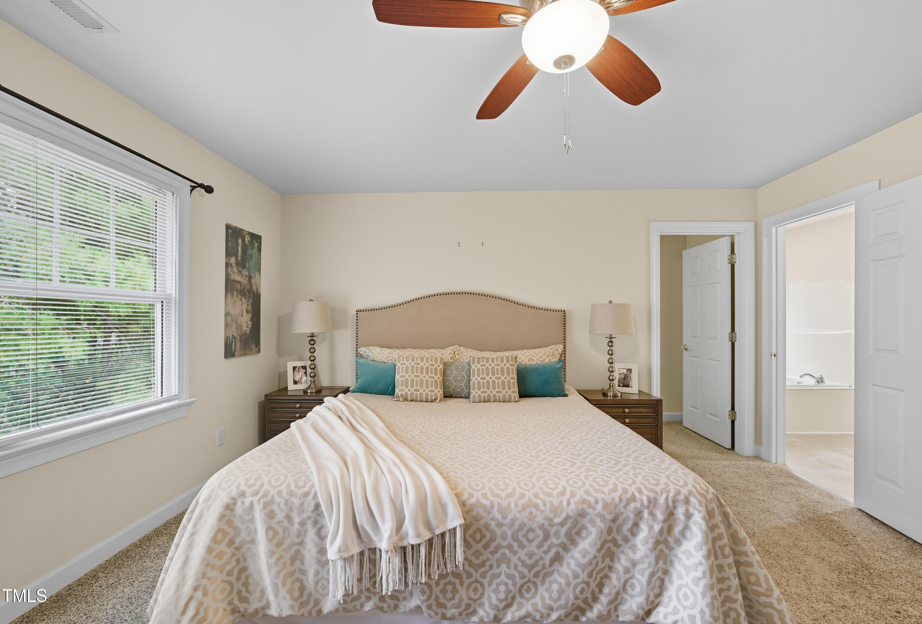 5210 Rio Grande Drive Raleigh, NC 27616 - Photo 29 of 45 a bedroom with a bed and a window