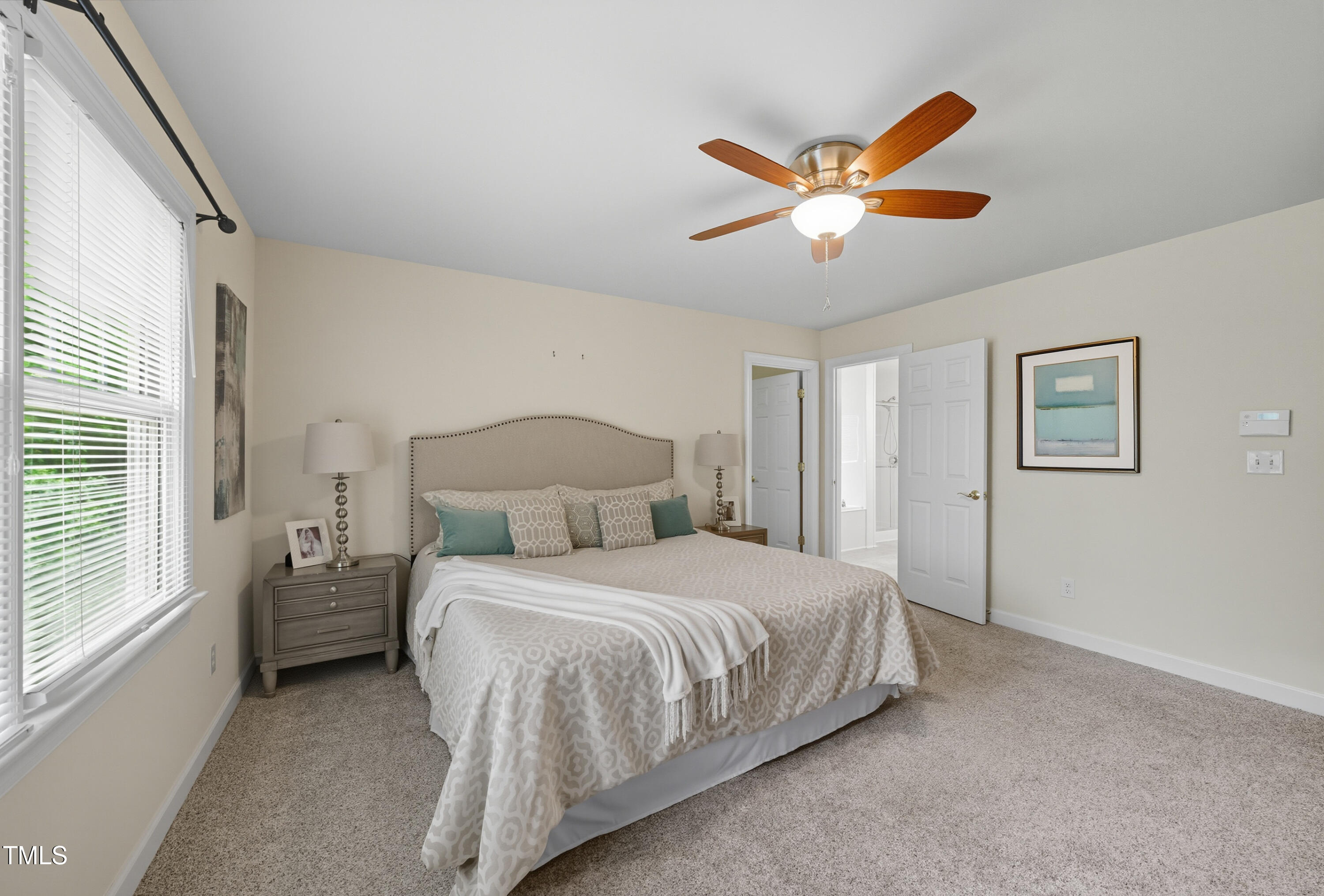 5210 Rio Grande Drive Raleigh, NC 27616 - Photo 30 of 45 a bedroom with a bed and window