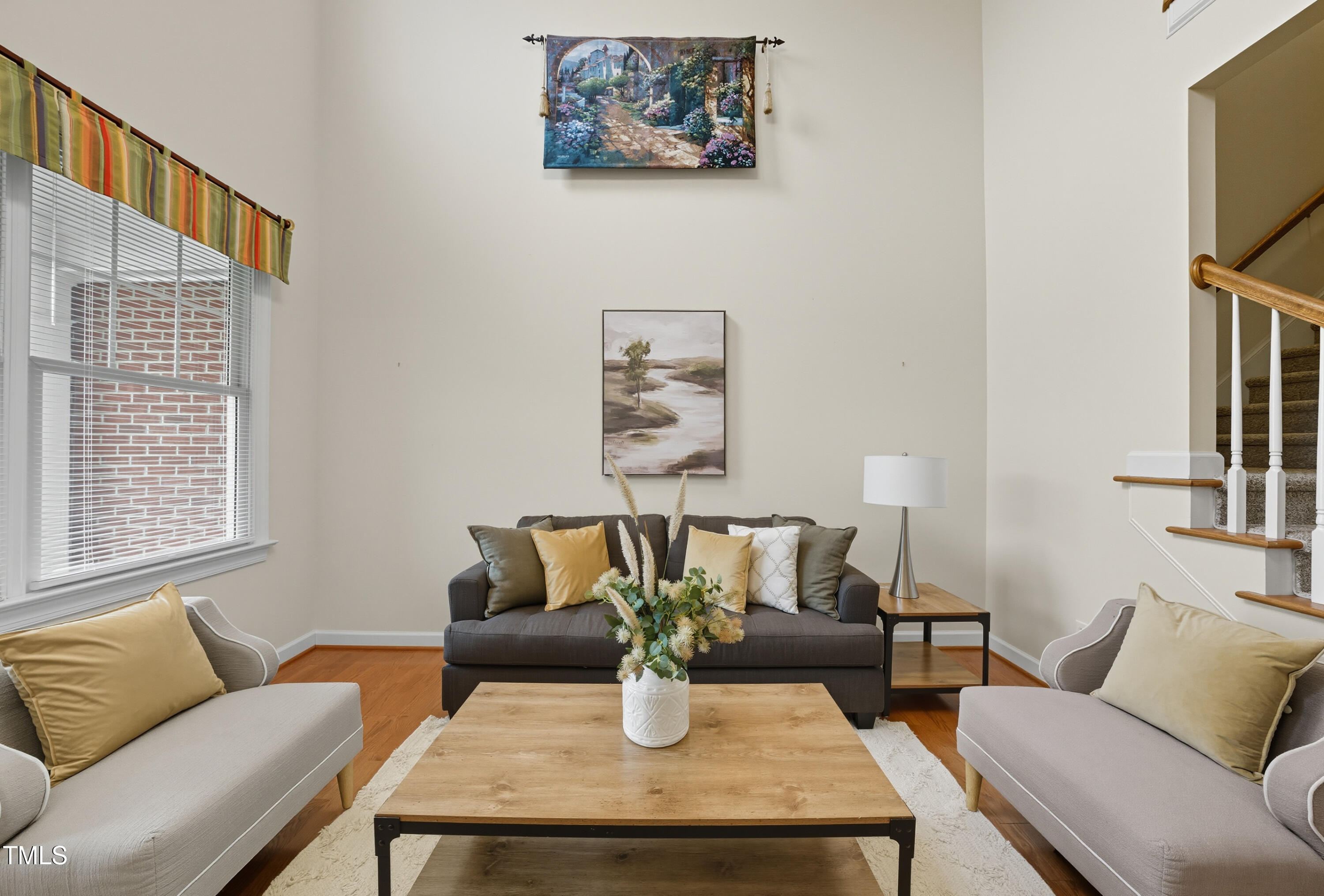 5210 Rio Grande Drive Raleigh, NC 27616 - Photo 5 of 45 a living room with furniture and a window