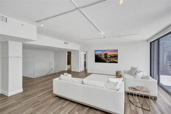 a bathroom with a bathtub and a sink