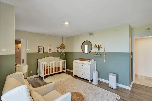 a bathroom with a granite countertop double sink mirror and double
