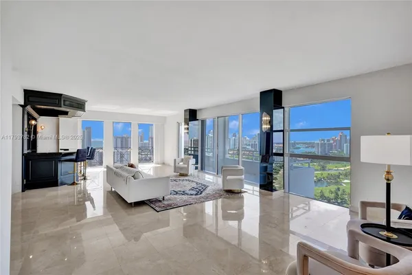 a large swimming pool with a table and chairs