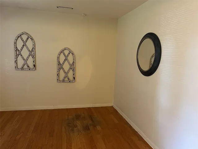 a close up of a wall with a door