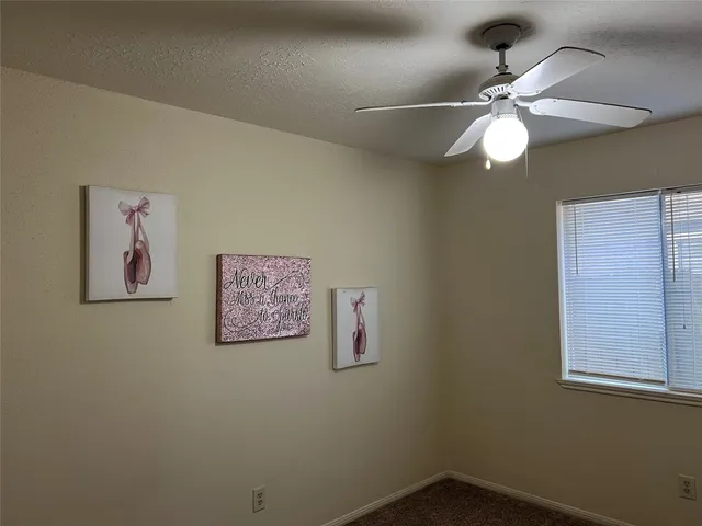 en view of a small space with a fan