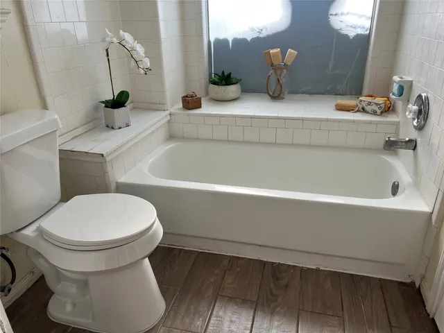 a bathroom with a sink and a toilet