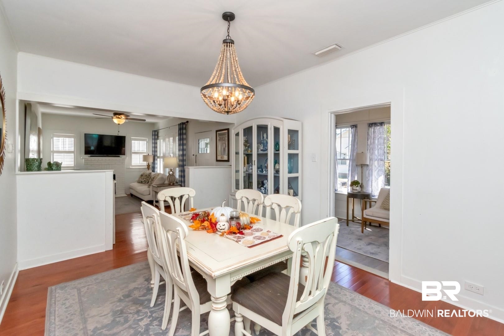 116 Item Avenue Mobile, AL 36607 - Photo 11 of 33 Dining room featuring hardwood / wood-style floors and ceiling fan with notable chandelier