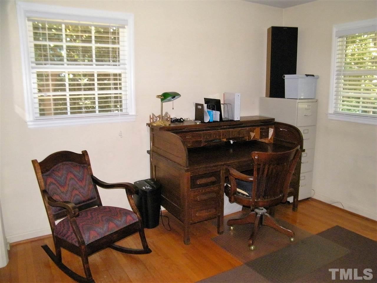 1302 Kingston Ridge Road Cary, NC 27511 - Photo 14 of 25 a living room with furniture and a window