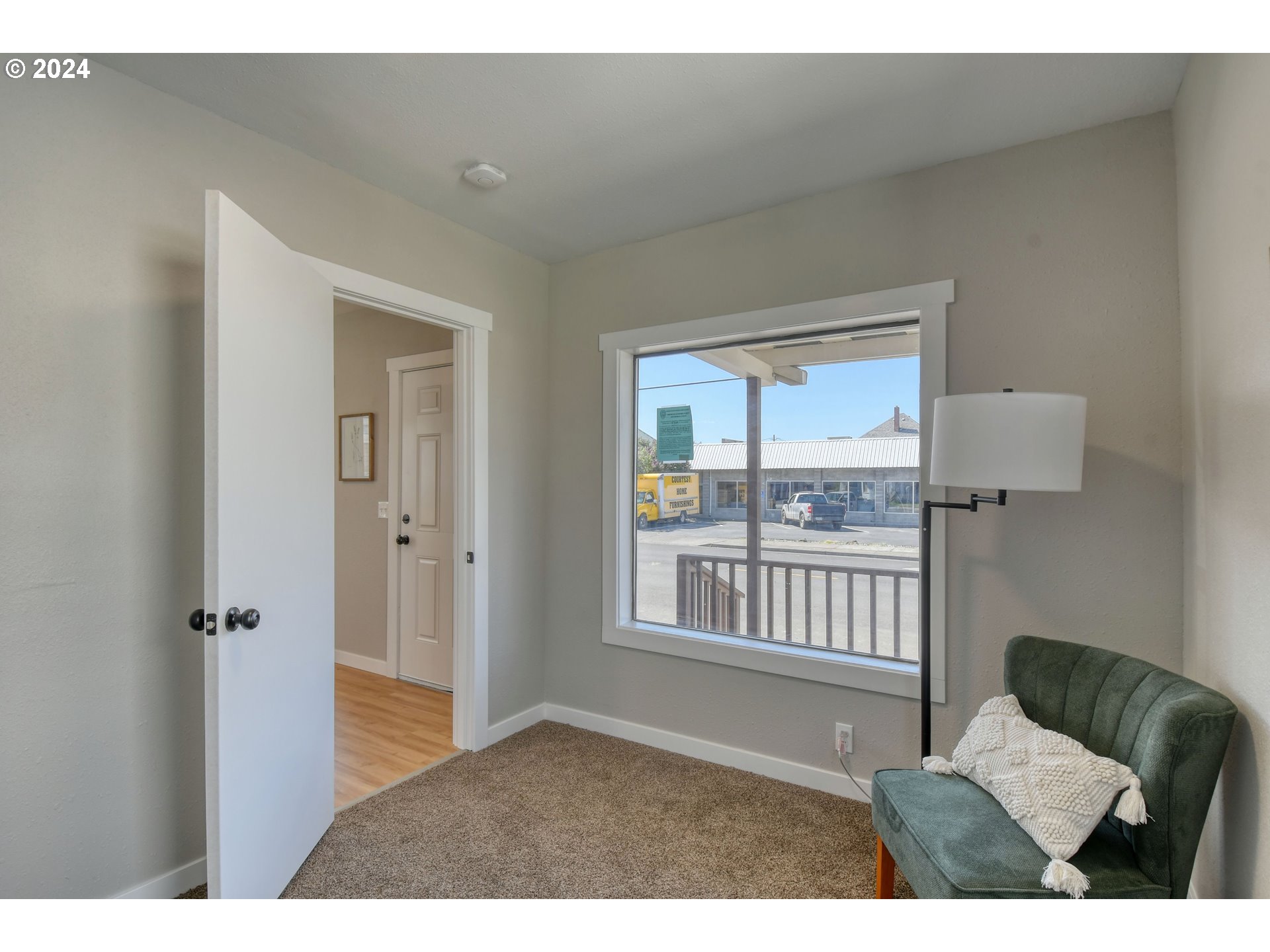 220 Southwest 4th Street Pendleton, OR 97801 - Photo 20 of 30 a living room with furniture and a window