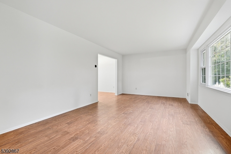 30 Brookside Road Edison, NJ 08817 - Photo 18 of 18 an empty room with wooden floor and windows