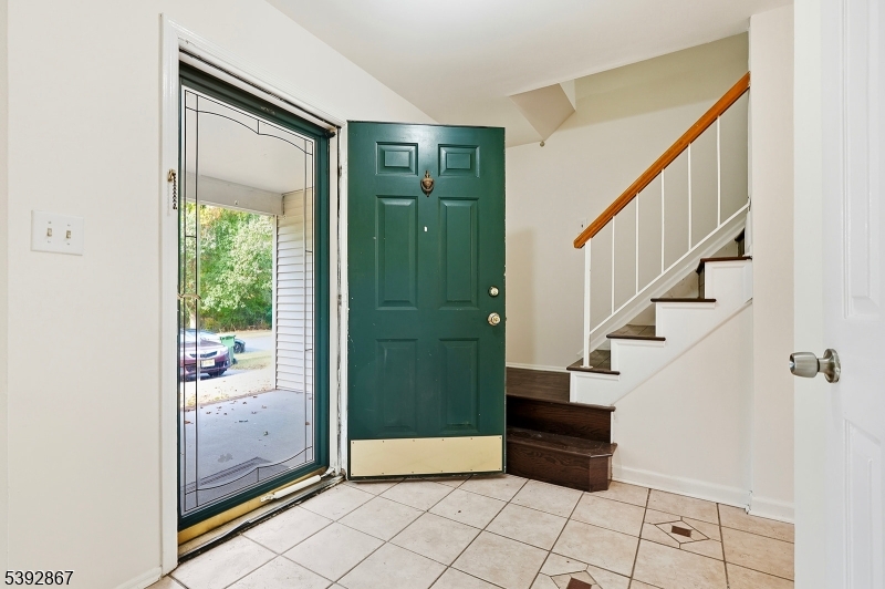 30 Brookside Road Edison, NJ 08817 - Photo 5 of 18 a view of entryway with wooden floor and a living room