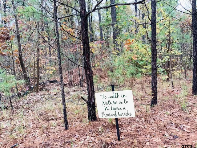 a sign on the side of the road