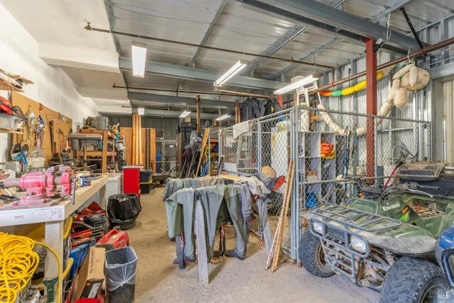 a view of a workspace with furniture