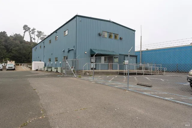 an aerial view of a residential houses with wooden floor