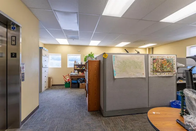 a room with furniture and a window