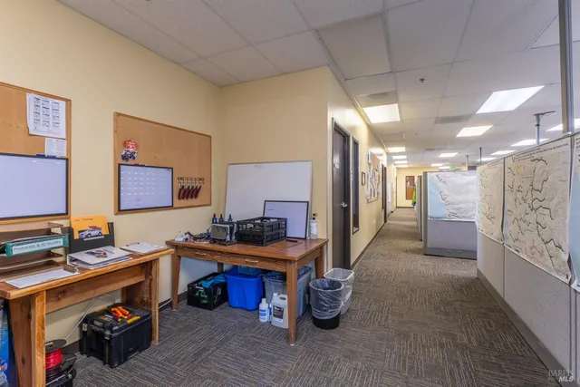 a view of a hallway with workspace