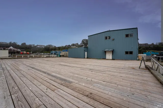 a view of a garage with wooden wall