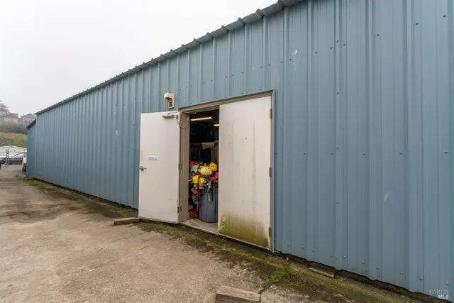 a view of outdoor space with wooden floor