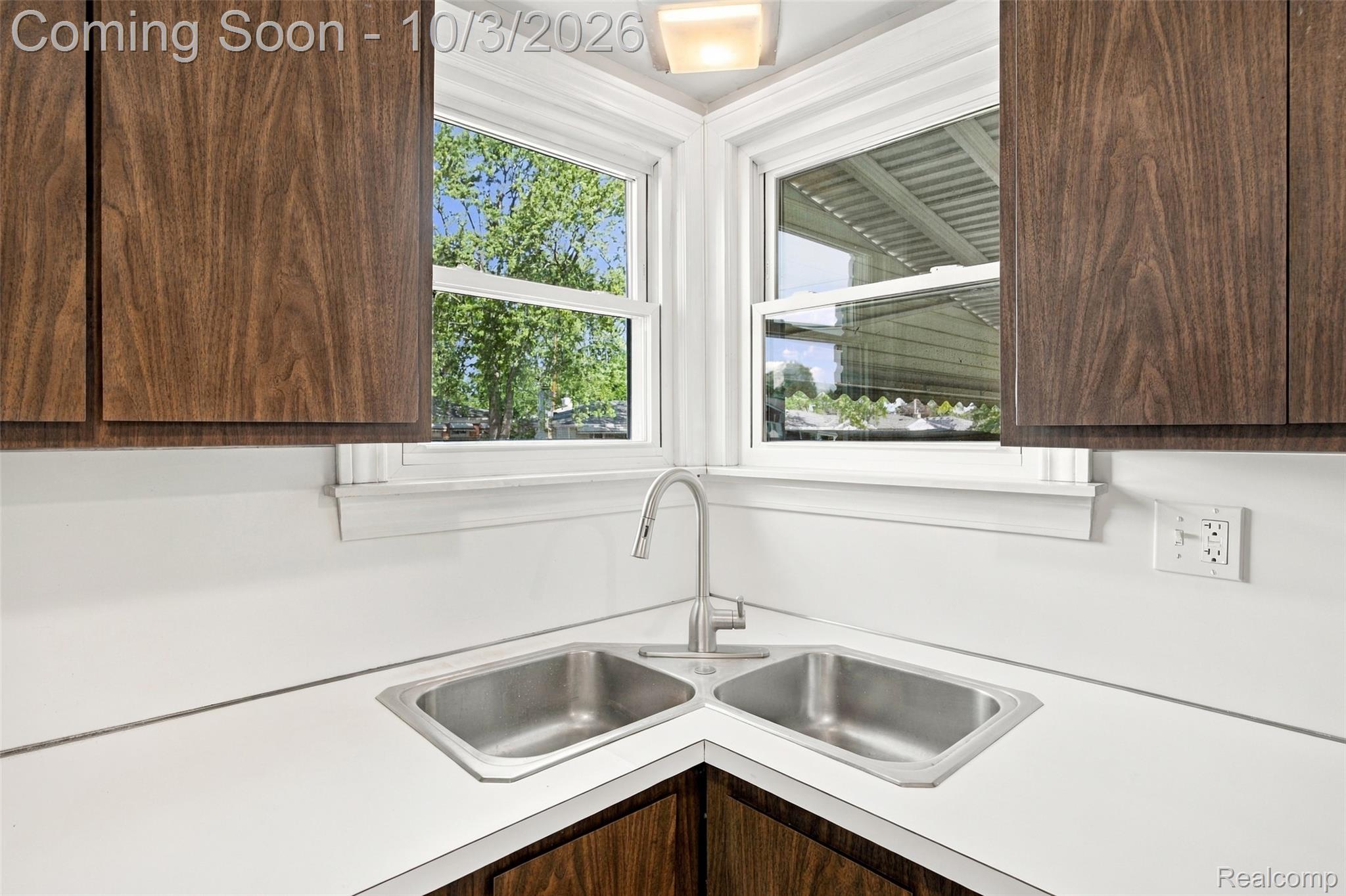 556 Henry Ruff Road Garden City, MI 48135 - Photo 7 of 49 Corner stainless steel double basin sink with a chrome faucet