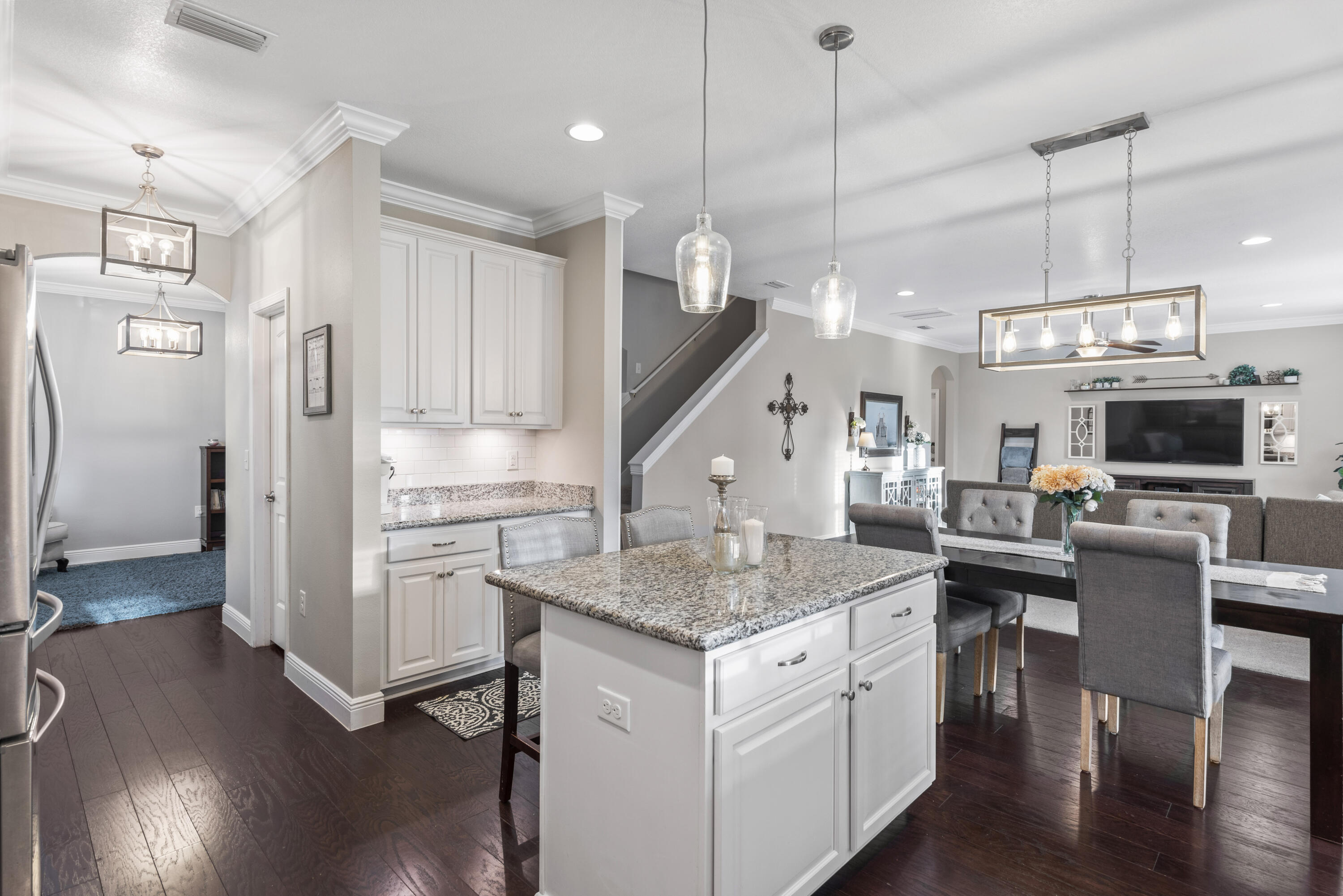 1584 Driftwood Point Road Santa Rosa Beach, FL 32459 - Photo 23 of 50 a kitchen with stainless steel appliances granite countertop a sink a refrigerator and a stove