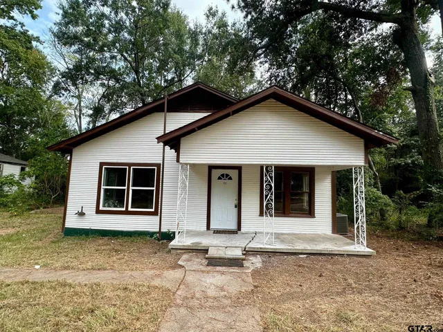 a house with white door of garage