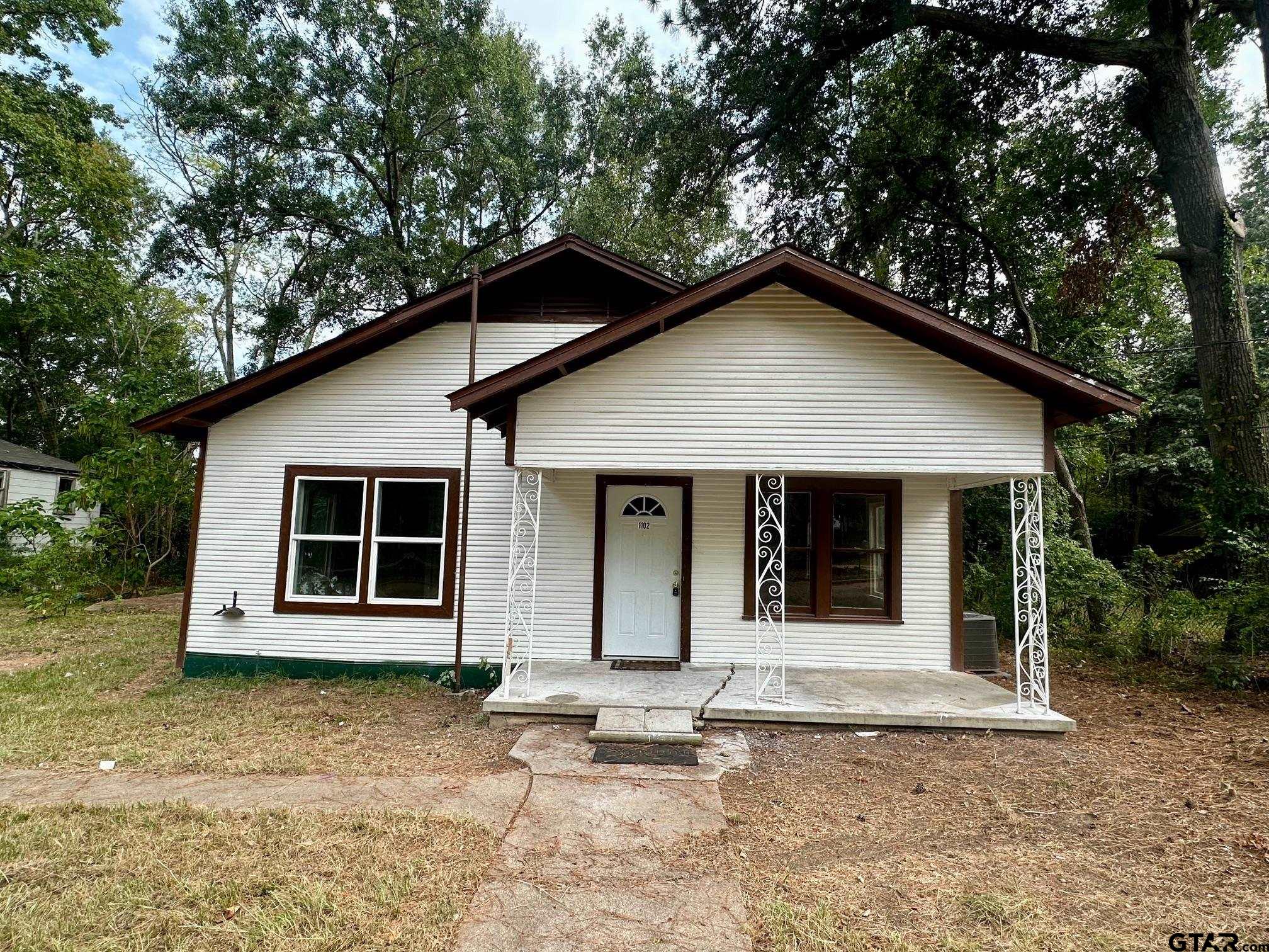 a house with white door of garage