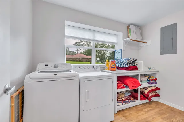 a utility room with dryer and washer
