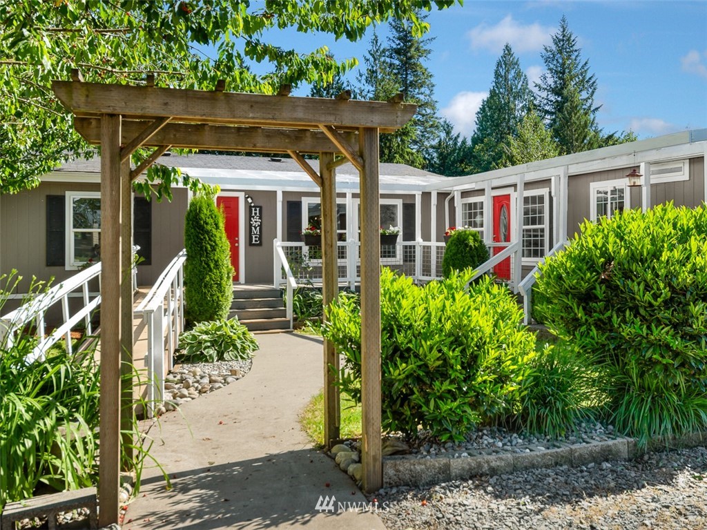 24226 Cromwell Road Monroe, WA 98272 - Photo 2 of 34 a front view of a house with a porch