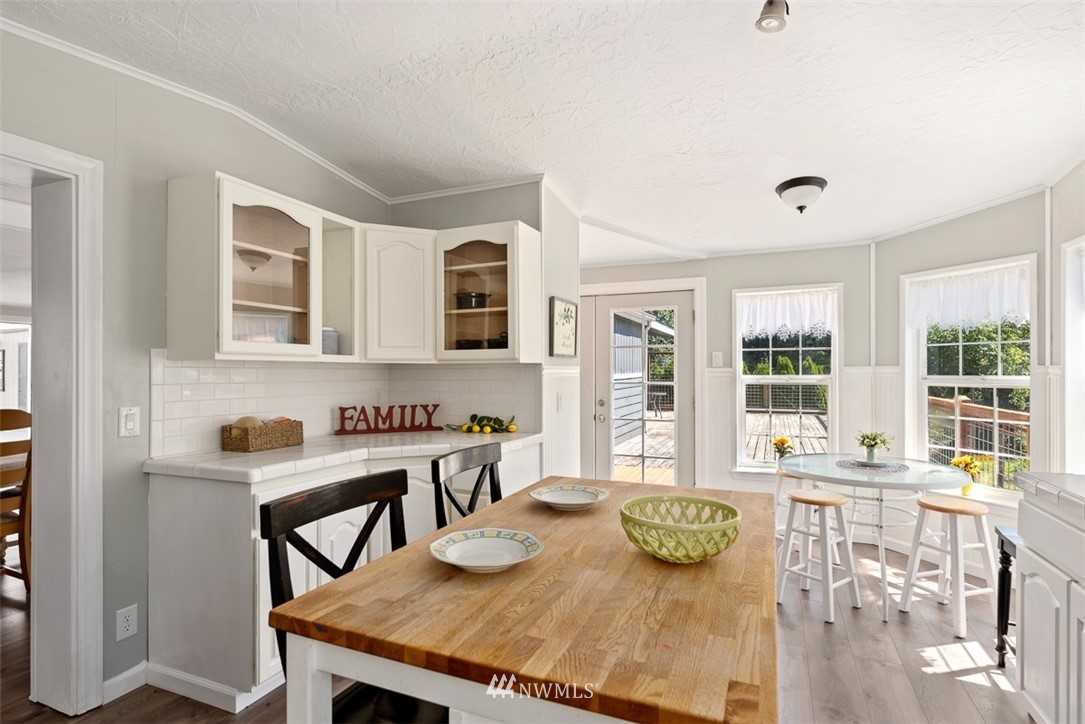 24226 Cromwell Road Monroe, WA 98272 - Photo 11 of 34 a view of a dining room with furniture window and outside view