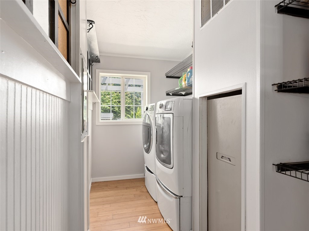 24226 Cromwell Road Monroe, WA 98272 - Photo 15 of 34 a bathroom with a washer and dryer
