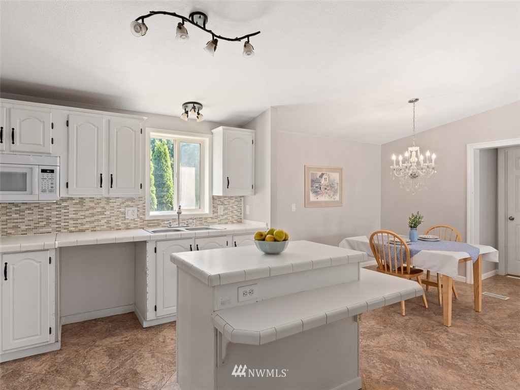 24226 Cromwell Road Monroe, WA 98272 - Photo 21 of 34 a kitchen with a sink cabinets and window