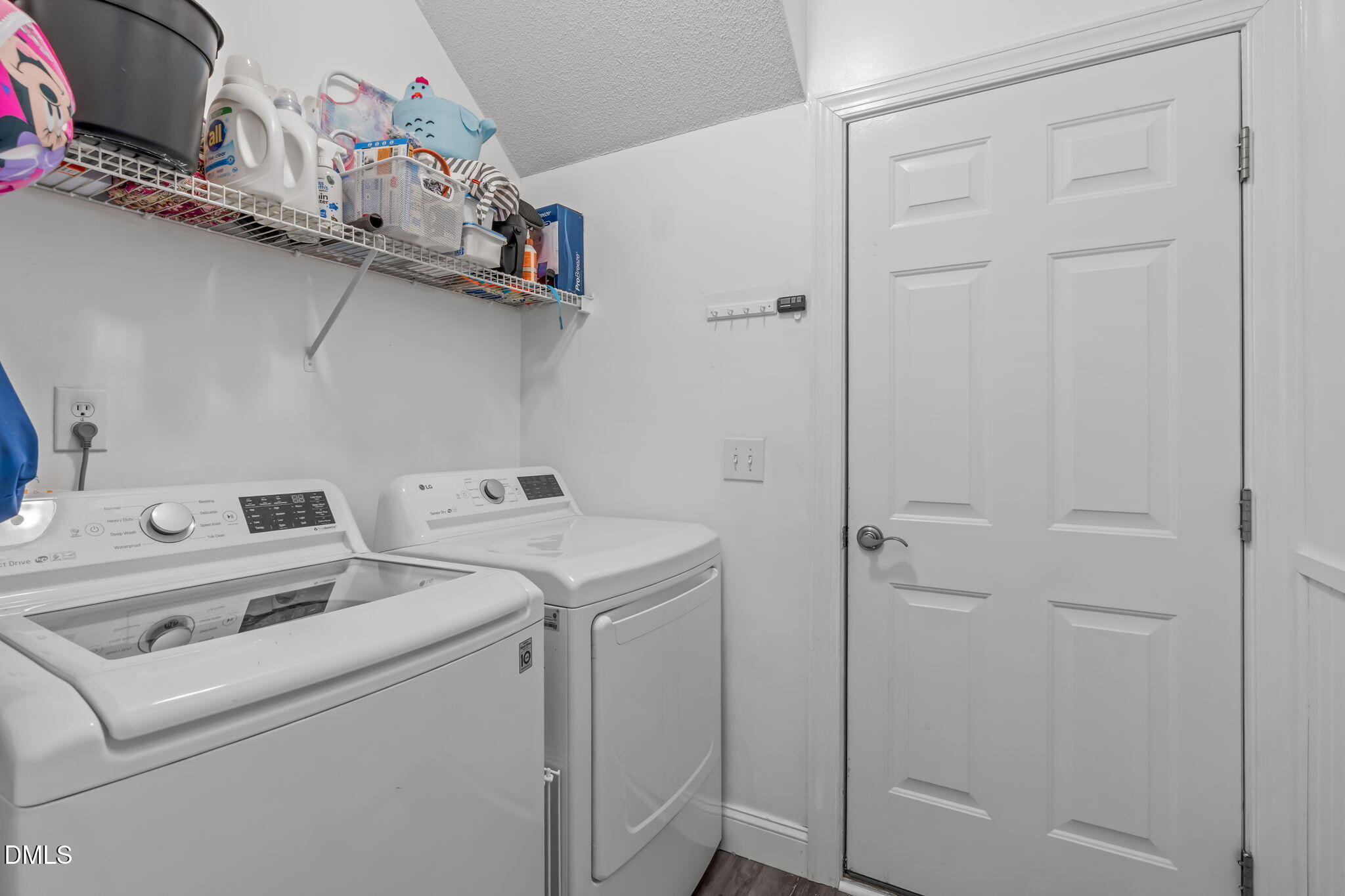 2501 Springfield Park Drive Raleigh, NC 27614 - Photo 21 of 44 a utility room with dryer and washer