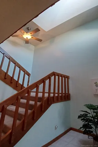 a view of staircase with lots of wooden floor