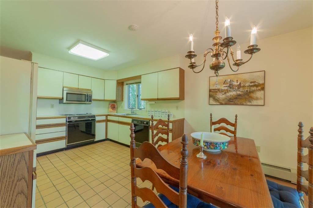 89 Appalachee Road Boothbay Harbor, ME 04538 - Photo 15 of 27 The eat-in kitchen with laminate...
