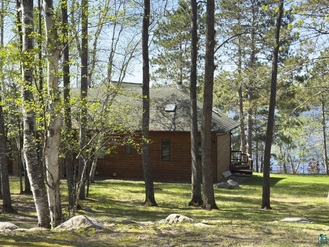 1880 Everett Bay Road Tower, MN 55790 - Photo 48 of 50 View of side of property featuring a lawn