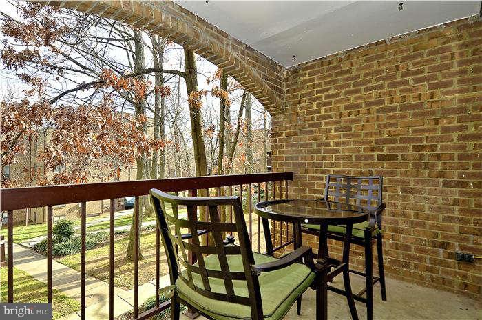 11204 Chestnut Grove Square, Unit 205 Reston, VA 20190 - Photo 11 of 25 Comfortable Patio Overlooking Courtyard