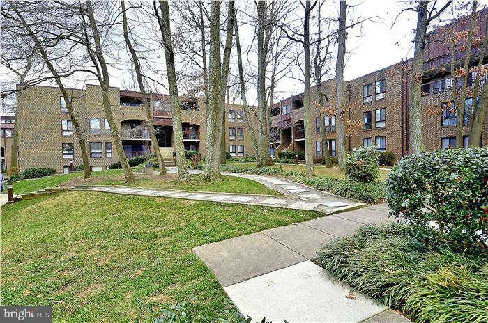 11204 Chestnut Grove Square, Unit 205 Reston, VA 20190 - Photo 16 of 25 Building Courtyard & Walking Path