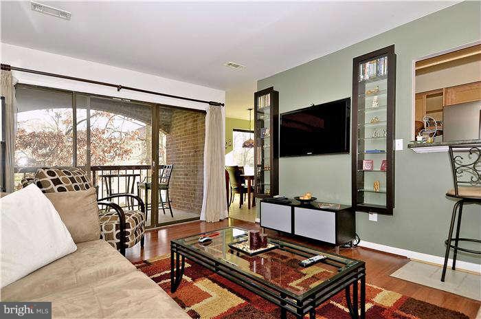 11204 Chestnut Grove Square, Unit 205 Reston, VA 20190 - Photo 4 of 25 Oversized & Comfortable Living Room