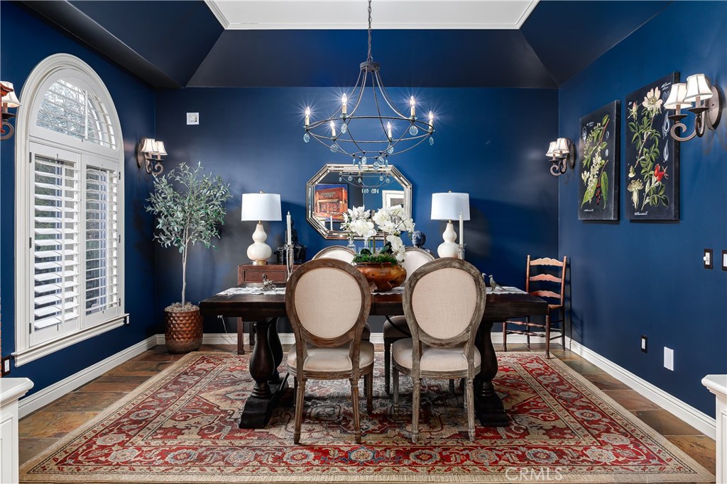 6400 San Gabriel Road Atascadero, CA 93422 - Photo 16 of 50 a view of a dining room with furniture chandelier and wooden floor