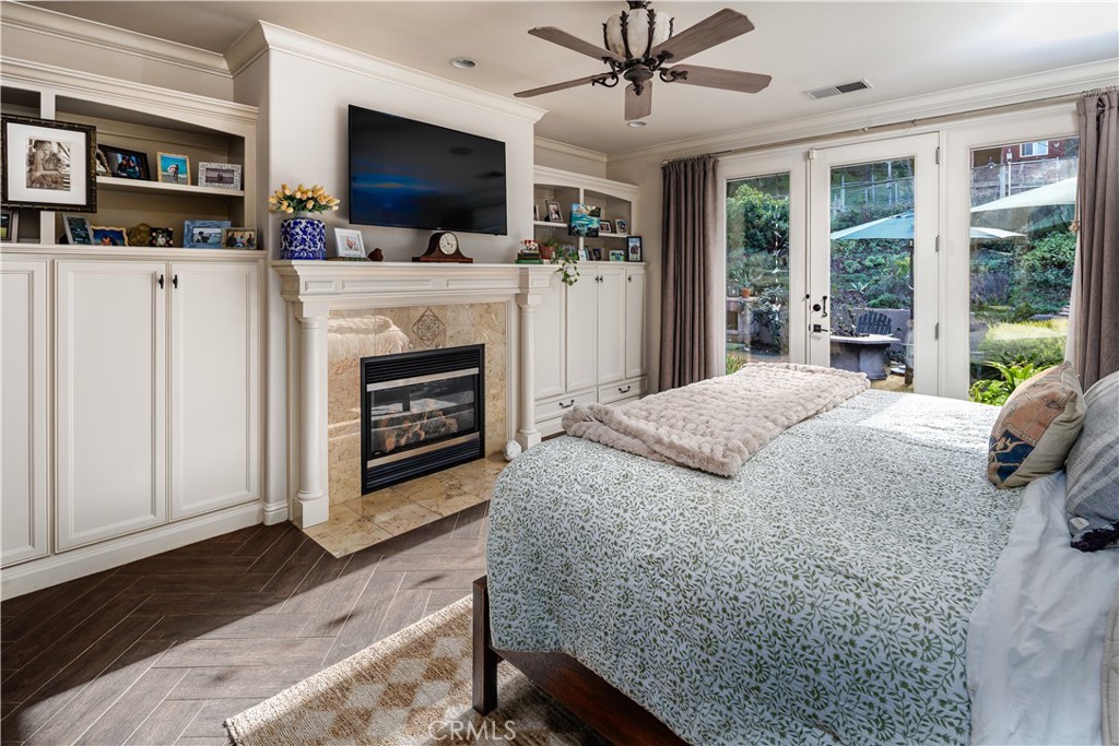 6400 San Gabriel Road Atascadero, CA 93422 - Photo 19 of 50 a living room with furniture a flat screen tv and a fireplace