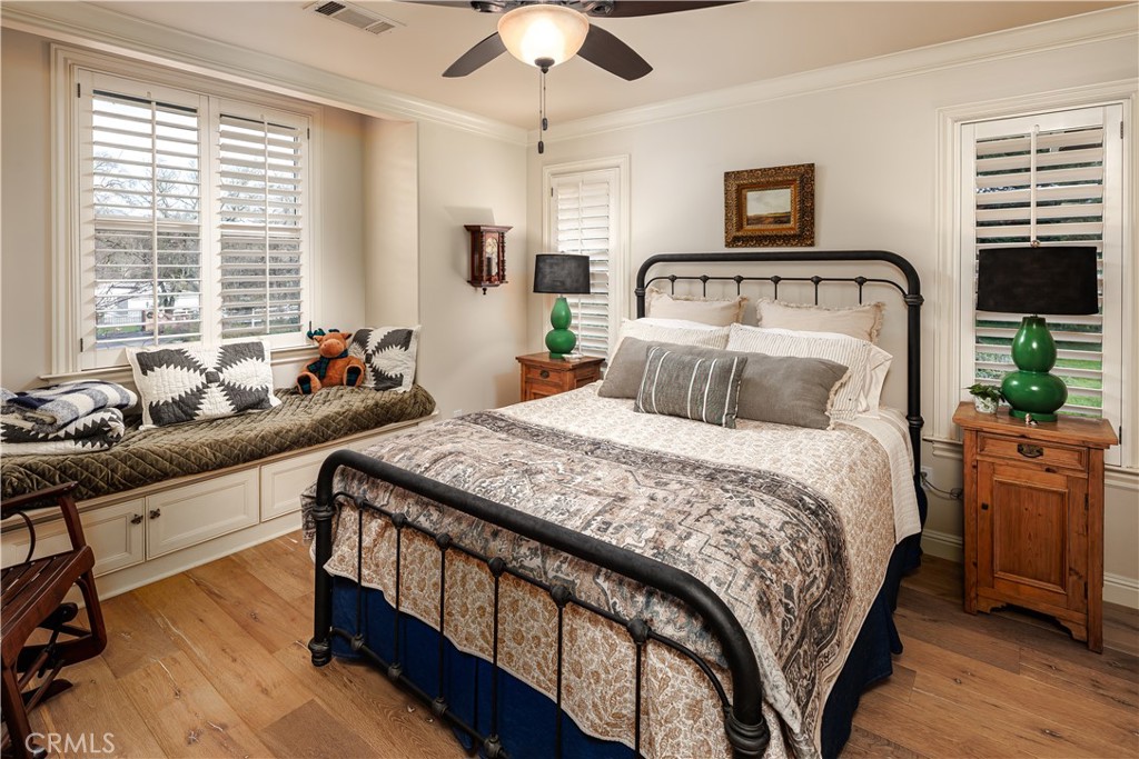 6400 San Gabriel Road Atascadero, CA 93422 - Photo 29 of 50 a bedroom with bed and wooden floor