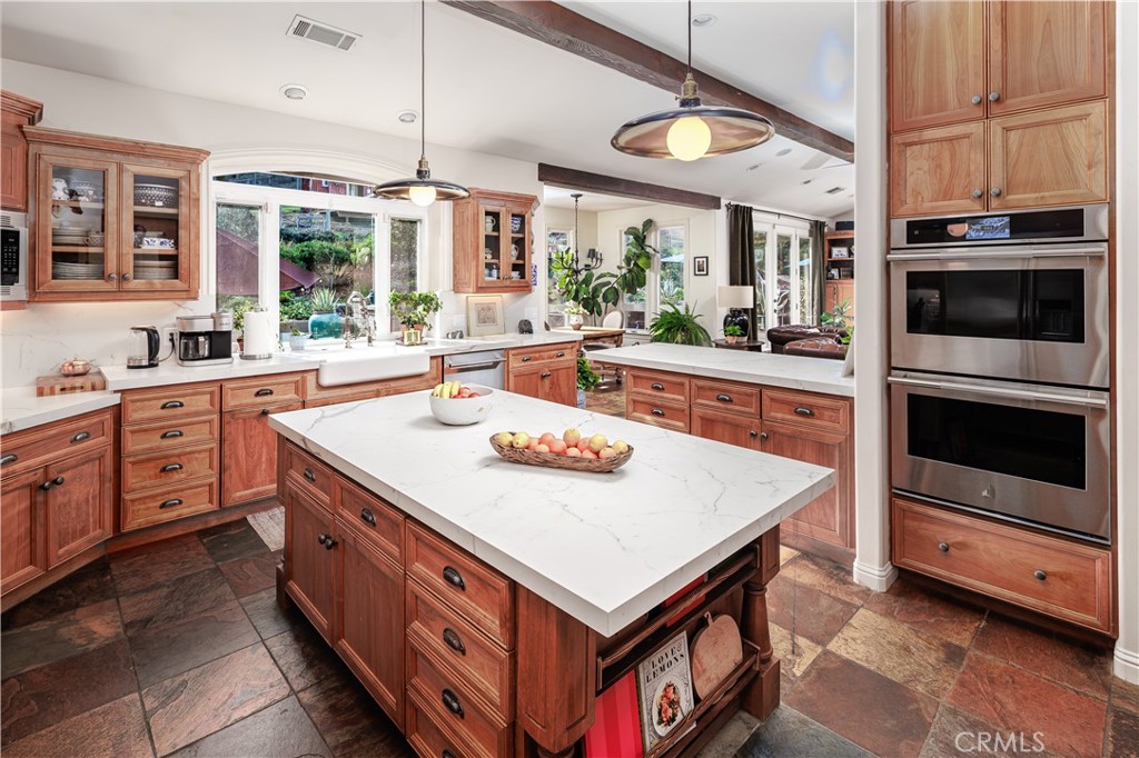 6400 San Gabriel Road Atascadero, CA 93422 - Photo 4 of 50 a kitchen that has a stove and a table