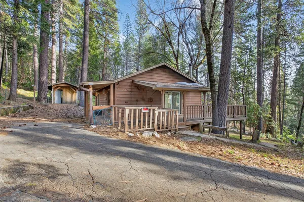 a house with trees in the background