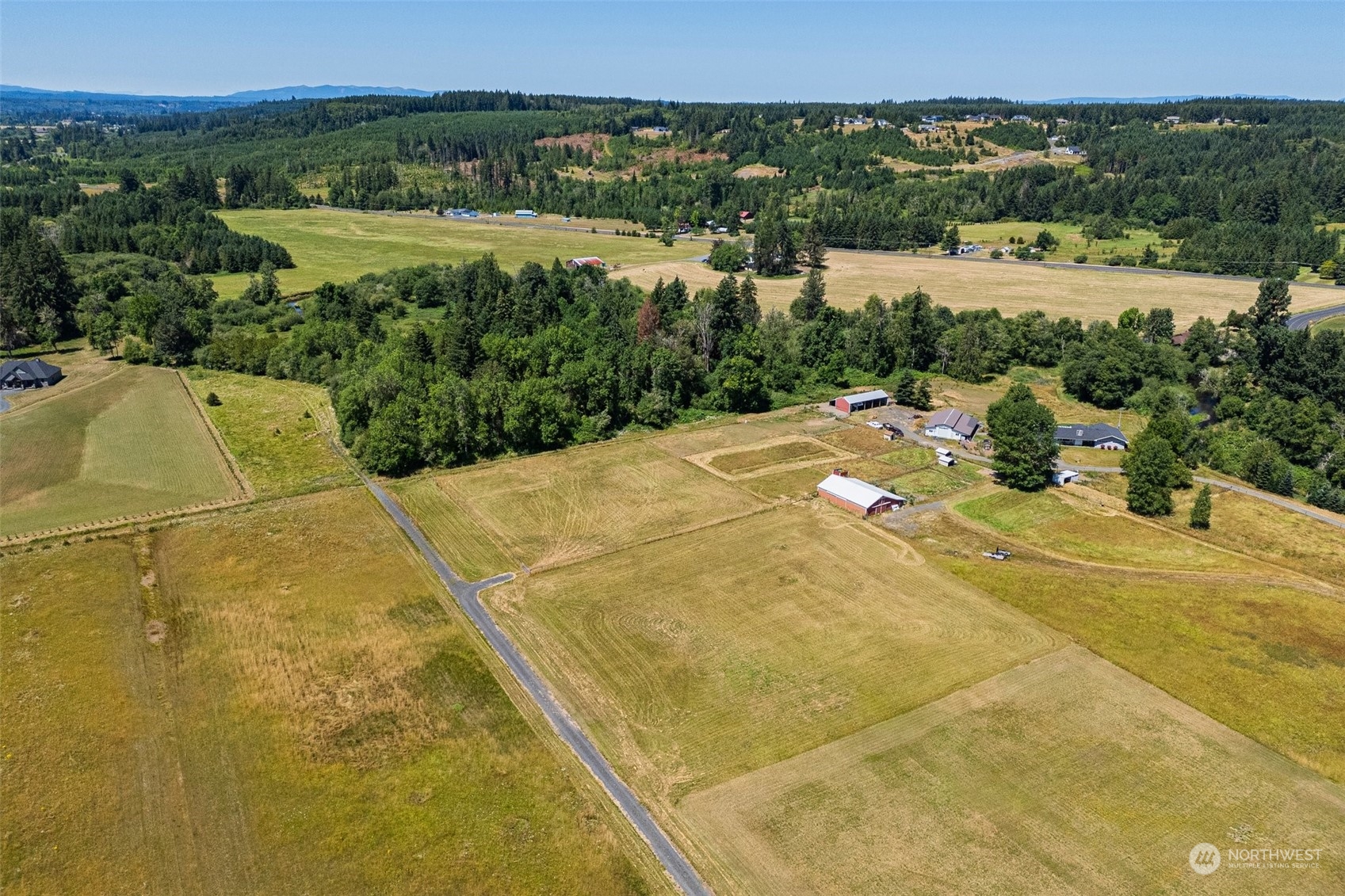 591 Tauscher Road Chehalis, WA 98532 - Photo 6 of 15 a view of a swimming pool and lake view